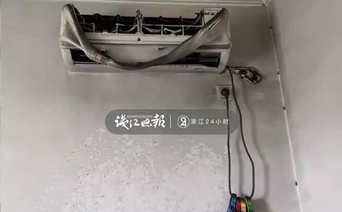 受高温辐射，卧室内的空调壳已经热化变形